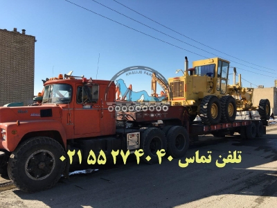 حمل گریدر Komats'u توسط کمرشکن 5 محور خلیج فارس ترابر
