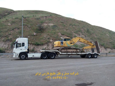 حمل بیل مکانیکی 200 کوماتسو (Komatsu)توسط کمر شکن 5 محور پلدار