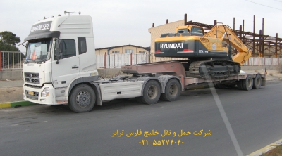 حمل بیل مکانیکی 220 هیوندای (Hyundai) توسط کمرشکن 5 محور شرکت حمل و نقل خلیج فارس ترابر