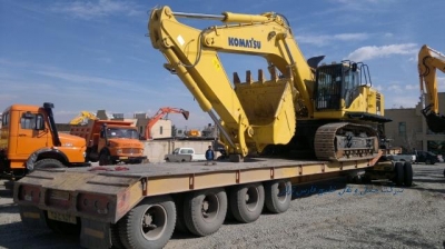 بیل مکانیکی600 کوماتسو حمل توسط کمرشکن 11 محور