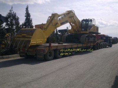 بیل مکانیکی کوماتسو  600  komatsu حمل توسط کمرشکن 11 محور شرکت حمل ونقل خلیج فارس ترابر  