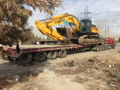 حمل بیل مکانیکی توسط کمرشکن 11 محور
