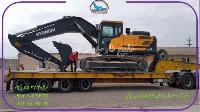 حمل محمولات  سنگین بیل مکانیکی هیوندای Hyundai excavator ازمبدا تهران به مقصد گلگهر توسقط کمرشکن7محور شرکت حمل ونل خلیج فارس ترابر
