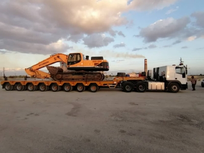 حمل محمولات سنگین بیل مکانیکی 430 هیوندایExcavator 430 Hyundai از مبدا تهران به مقصد هرمزگان توسط کمرشکن 11 محور شرکت خلیج فارس ترابر_1