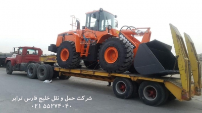 حمل لودر دوسان (DOOSAN)از مبدا تهران به مقصد تبریز توسط کمرشکن ۵ محور پل دار شرکت حمل و نقل خلیج فارس ترابر